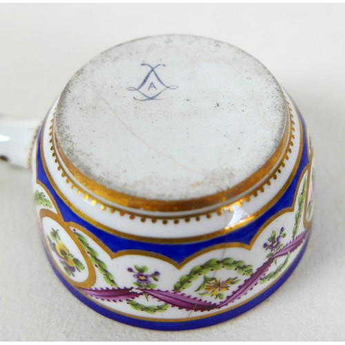 125 - An 18th century Sèvres porcelain saucepan, circa 1780, decorated with nine floral sprigs separated b... 