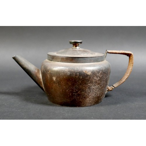 1 - A Victorian silver bachelor's teapot, with rattan handle, registration stamp to base, Jonathan Wilso... 