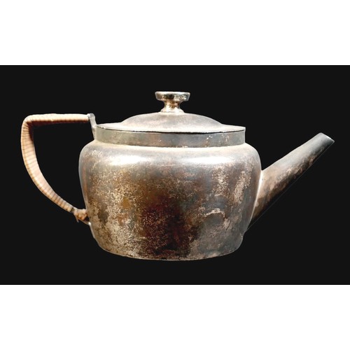 1 - A Victorian silver bachelor's teapot, with rattan handle, registration stamp to base, Jonathan Wilso... 