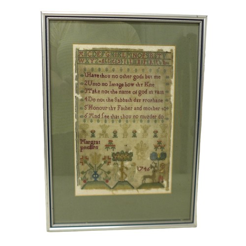 215 - A George II needlework sampler, pictorial and prose by Margrat Pitcairn. Housed in a modern frame, s... 