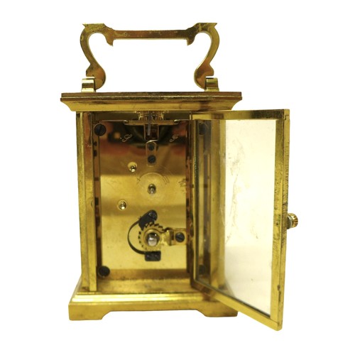 256 - A brass carriage clock signed Bernard Freres, 8 by 6 by 14.5 cm.