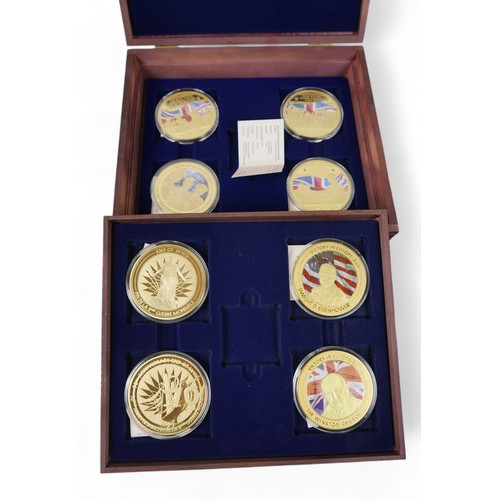 111 - A collection of WWII related Windsor Mint commemorative coins, housed in eight coin boxes and loose,... 