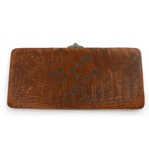 216 - A Victorian crocodile clutch wallet type case, presentation dated 1892, 32 by 3 by 15cm.