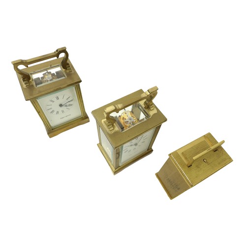 260 - Two brass carriage clocks and an alarm clock, carriage clocks measure 8 by 6 by 15cm high with handl... 