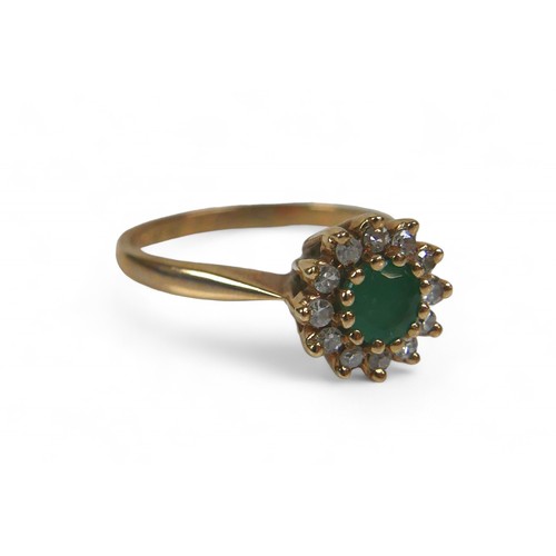 21 - A 9ct yellow cluster ring, set with an emerald and small diamonds, size O, 2.5g.