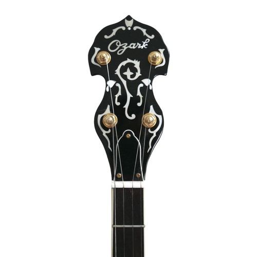 228 - A Ozark five-string banjo, with gilt metal mounts, mother of pearl inlays carved neck, transparent h... 