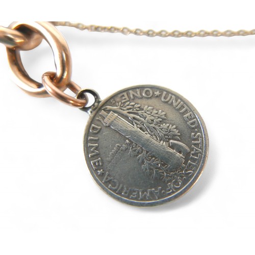 61 - A 9ct gold chain bracelet with padlock clasp, attached with a WWI silver related French coin and US ... 