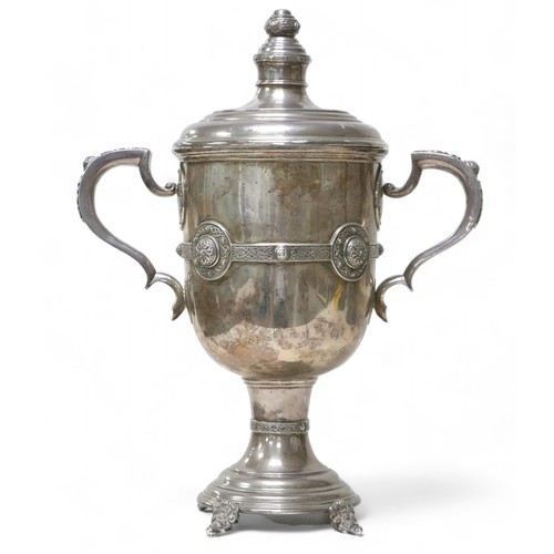 88 - A George V Irish silver twin handled trophy, with Celtic knot banding, with presentation inscription... 