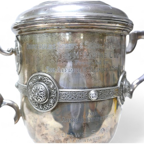 88 - A George V Irish silver twin handled trophy, with Celtic knot banding, with presentation inscription... 