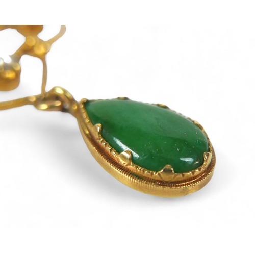 5 - An 18ct gold jade and pearl pendant, the central oval jade stone 7 by 10mm, tear drop shaped jade, 6... 