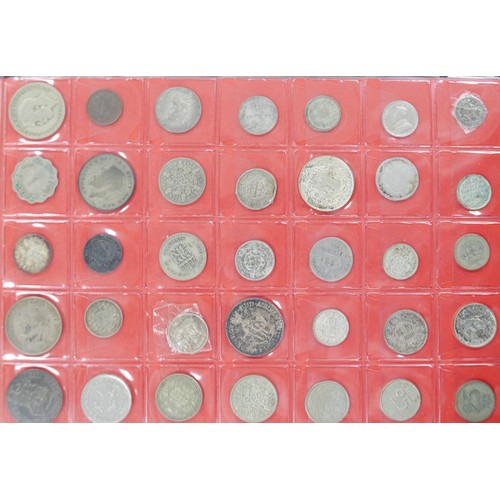 98 - A large collection of mainly British coins, including an Edward I silver penny, an Elizabeth I silve... 