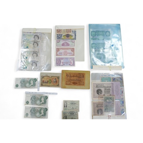 112 - A large collection of world bank notes, in an album and three folders.