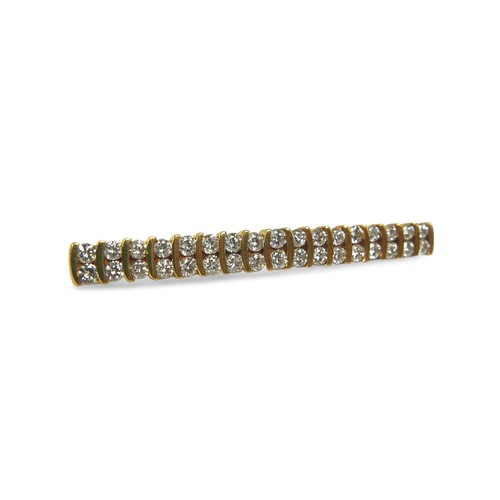 51 - An 18ct gold and diamond double row bar brooch, made up of 34 round, brilliant cut stones, each 2.70... 