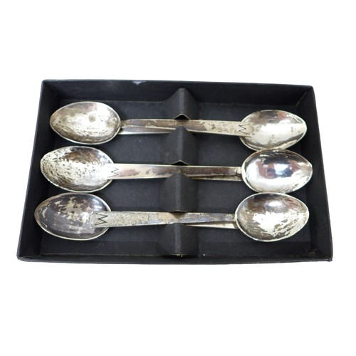 64 - A collection of silver, comprising of two  cased silver tea spoons and a cased silver handled fish s... 