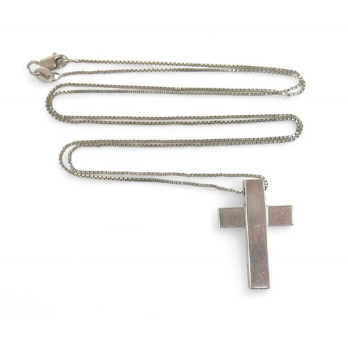 16 - A Gucci 925 silver crucifix on a silver chain, crucifix measures 18 by 3.7 by 25.7mm, chain 64cm.