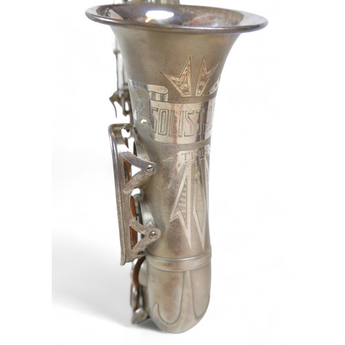 230 - A silver plated Weltklang Solist de Lux saxophone, in original box.