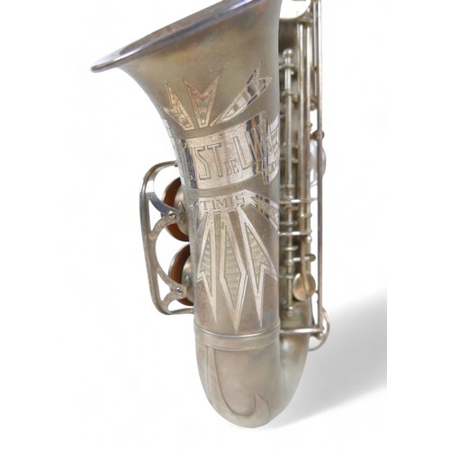 230 - A silver plated Weltklang Solist de Lux saxophone, in original box.