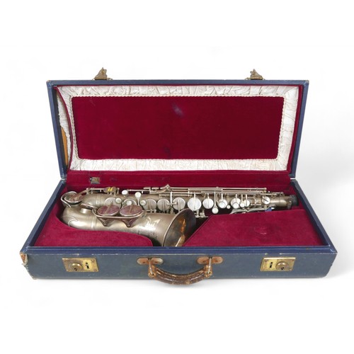 230 - A silver plated Weltklang Solist de Lux saxophone, in original box.