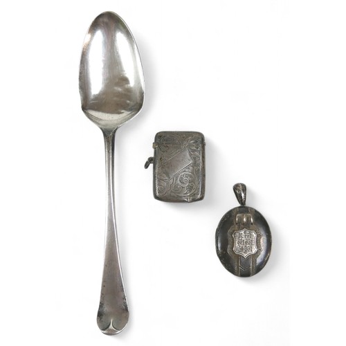 66 - A Georgian silver spoon, a silver vesta and a white metal locket, total weight 93.8g (3)