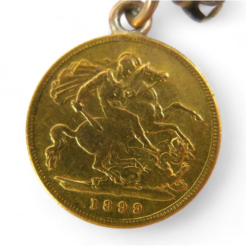 50 - A 9ct yellow gold chain with a Victoria gold sovereign and two half sovereigns, dated 1900, 1899 and... 