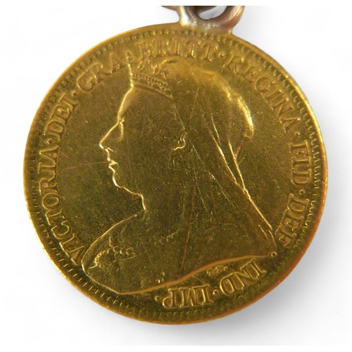 50 - A 9ct yellow gold chain with a Victoria gold sovereign and two half sovereigns, dated 1900, 1899 and... 