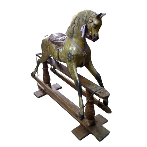 245 - A large Victorian dapple grey painted rocking horse, with leather saddle and tack, 152 by 40 by 126c... 