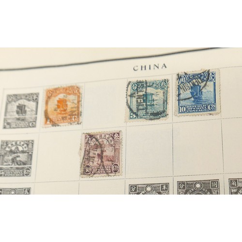 225 - Philatelic: An early 20th century collection of GB and world stamps, to include three albums (two re... 