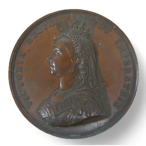 92 - A bronze Victoria commemorative token, 7.5 by 0.5cm.