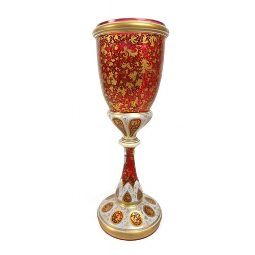 192 - A late 19th early 20th century Bohemian overlay glass goblet vase, 12 by 36cm high.