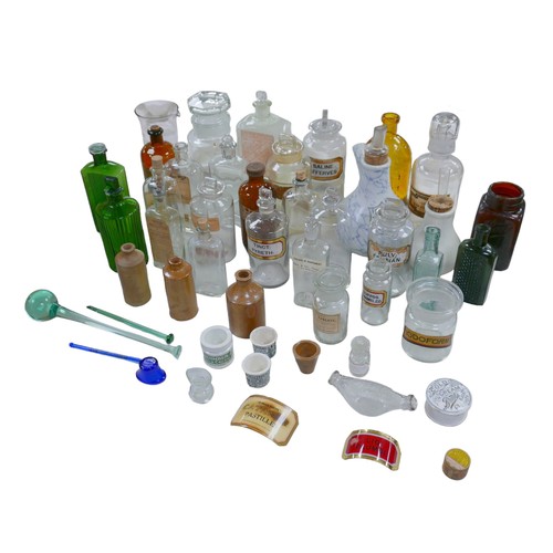 252 - A large collection of over forty pharmaceutical vials and jars, including inhalers, medicine bottles... 