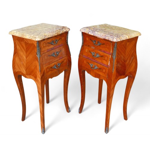 347 - A pair of early to mid 20th century French bombe shaped cherry wood nightstands, with gilt metal mou... 