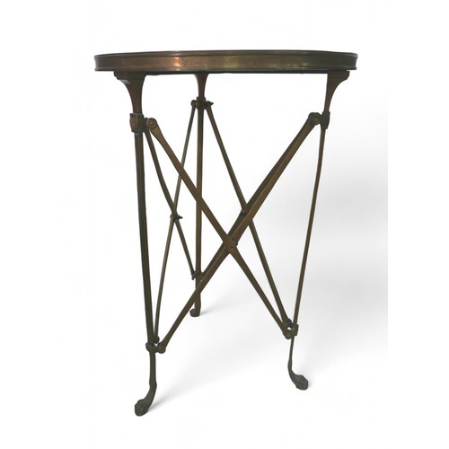 352 - A pair of Gueridon style Neoclassical black stone and brass side tables, each raised on three-legs w... 