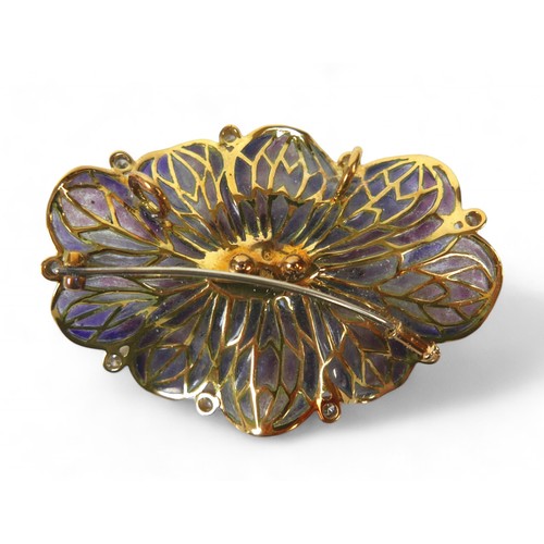 3 - An 18ct yellow gold plique-à-jour enamel brooch, designed by Ivor Gordon, set with a central amethys... 