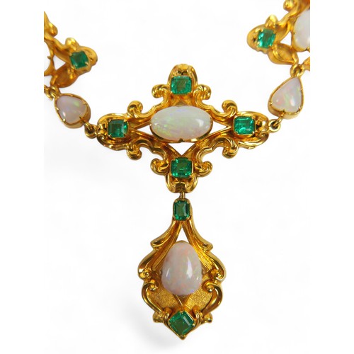 53 - A gilt metal opal and emerald drop pendant necklace, set with sixteen emeralds and sixteen opals, su... 