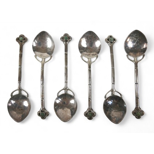 86 - A set of six Liberty Cymric silver spoons, set with Chalcedony, Birmingham 1904, in original box.