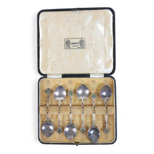 86 - A set of six Liberty Cymric silver spoons, set with Chalcedony, Birmingham 1904, in original box.