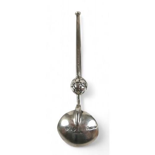 79 - An Arts & Crafts Liberty & Co. silver Coronation spoon, with tapered stem embellished with a lattice... 