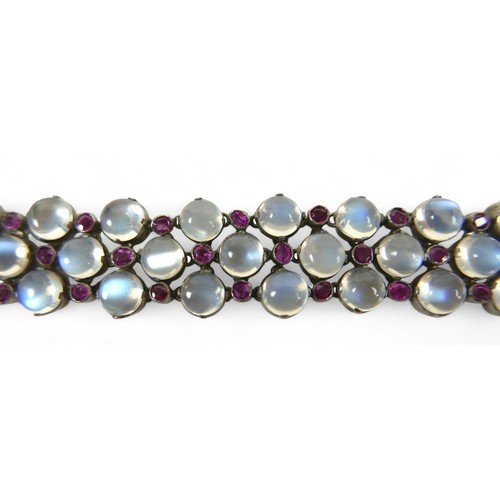 35 - A vintage moonstone and ruby bracelet, made up of 44 moonstones, each 6.5mm diameter, and 43 small r... 