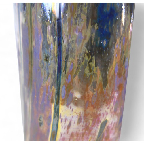 195 - A tall studio art glass vase by Sam Herman (1936-2020), the surface decorated with metallic oxide ir... 