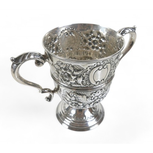 80 - An Edward VII silver twin handle trophy cup with embossed decoration William Hutton & Sons Ltd Sheff... 