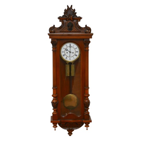 254 - An early 20th century regulator clock, with Roman numeral dial, twin train movement, pendulum and we... 