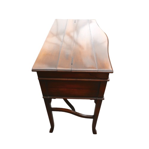 358 - A writing desk and chair by Theodore Alexander, the desk having a lift up top and fitted interior ab... 