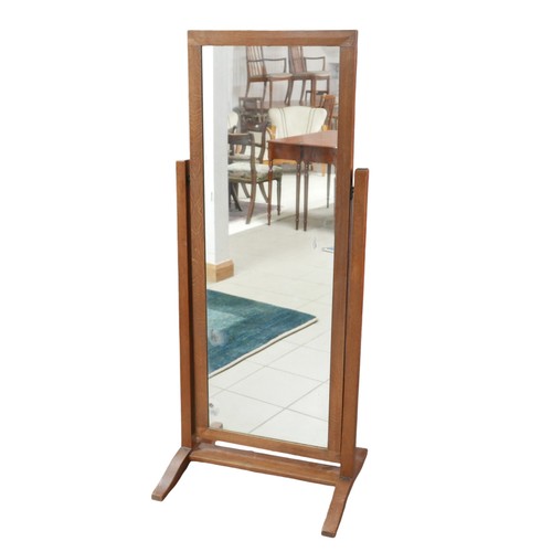 340 - An Arts & Crafts oak framed cheval mirror, 66 by 56 by 158cm high.