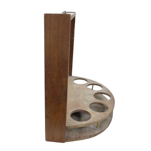 205 - A faux bookcase wine bottle stand, with mirror back, 56 by 32.5 by 51.5cm high.