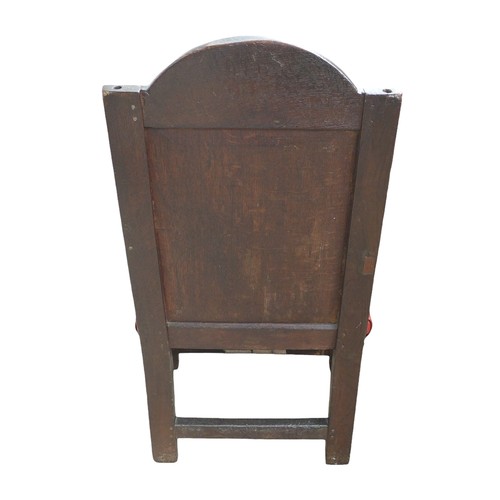 350 - A 17th century oak Wainscot chair, with red leather upholstered seat, 106 by 45 by 57cm.