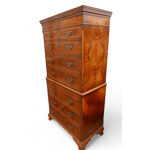 346 - A Georgian style walnut chest on chest, two small drawers over six large, with brushing slide, and b... 