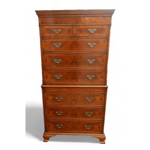 346 - A Georgian style walnut chest on chest, two small drawers over six large, with brushing slide, and b... 