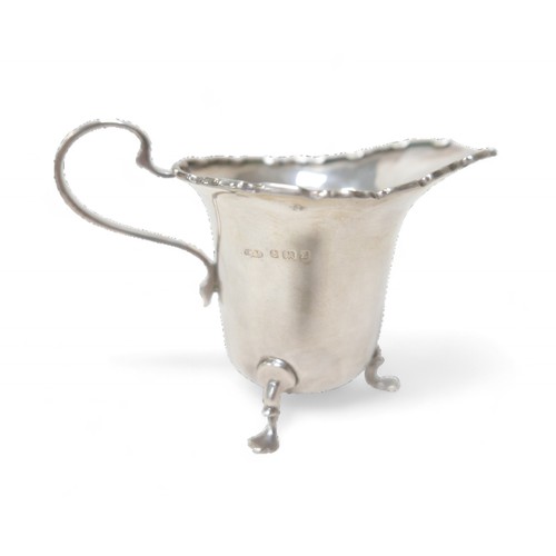 78 - A group of Georgian and later silver, including a George III teaspoon, George Gray, a milk jug, Lond... 