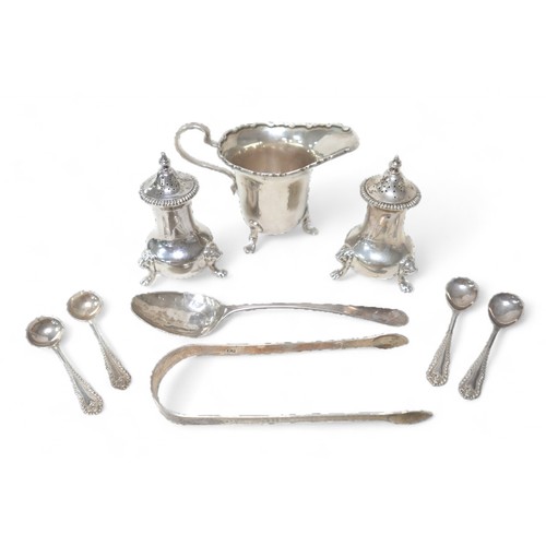 78 - A group of Georgian and later silver, including a George III teaspoon, George Gray, a milk jug, Lond... 