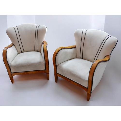 369 - A pair of 1930s Swedish Art Deco birchwood framed armchairs, with cream faux suede upholstery, each ... 